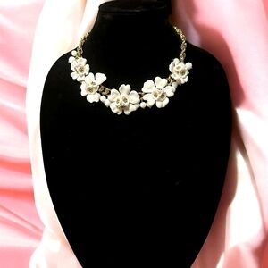 chunky white enamel flower necklace on gold chain